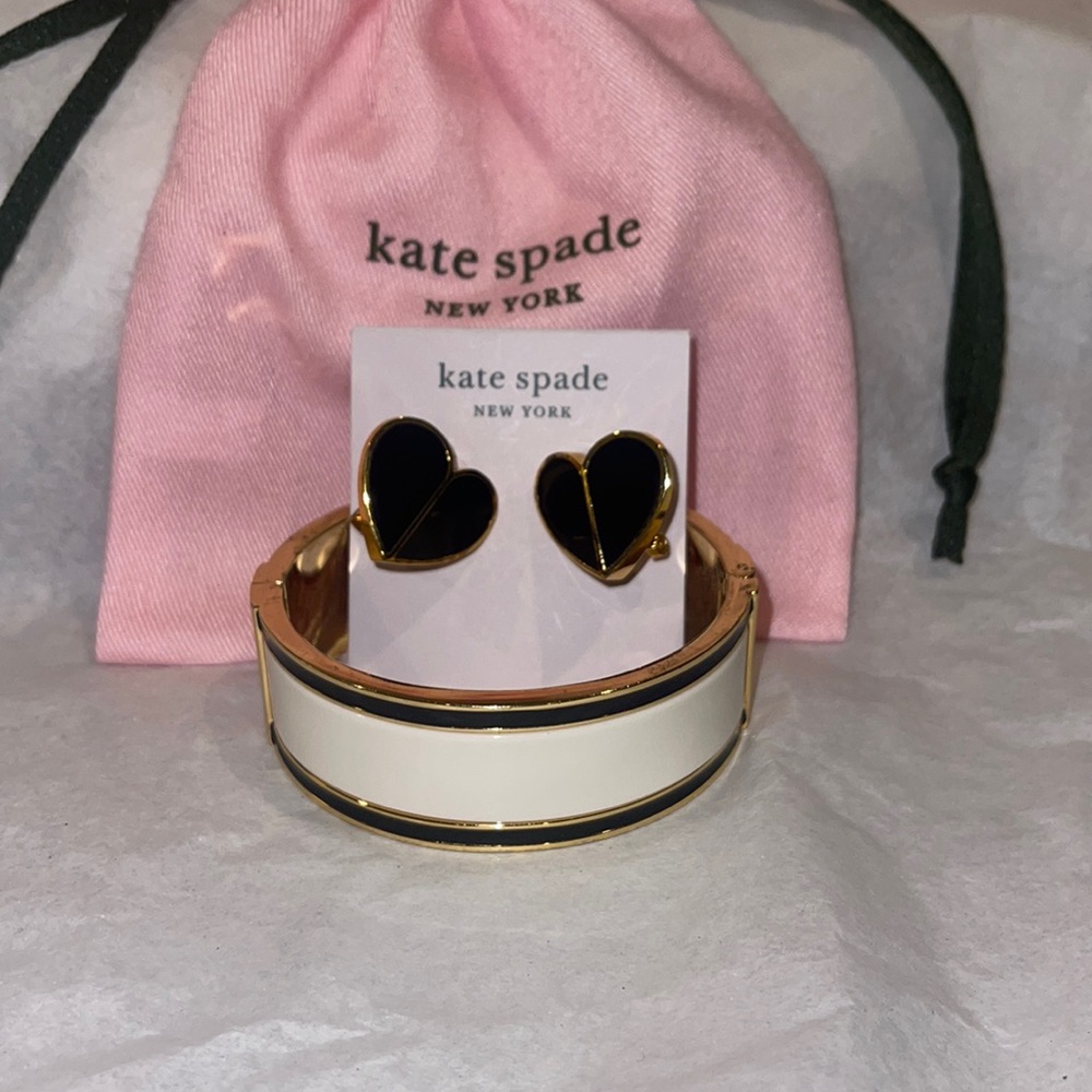 Kate spade pierced clip on spade shaped earrings